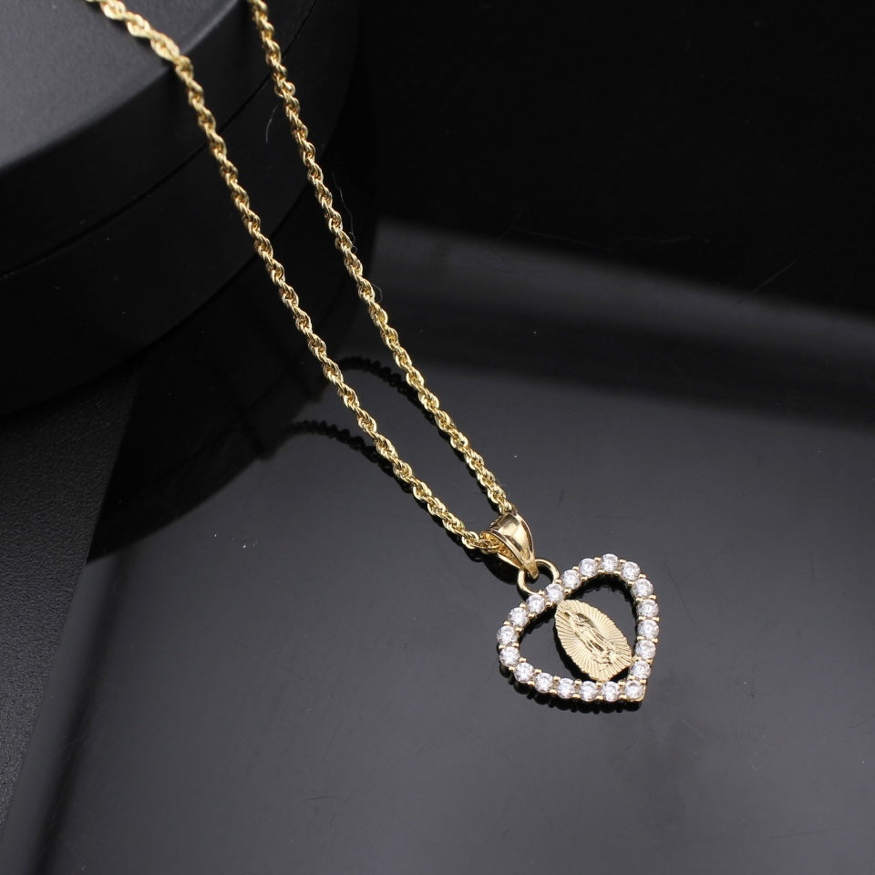 Real 10K Gold Heart Virgin Mary Pendant on cream – solid gold not plated Oro Quince